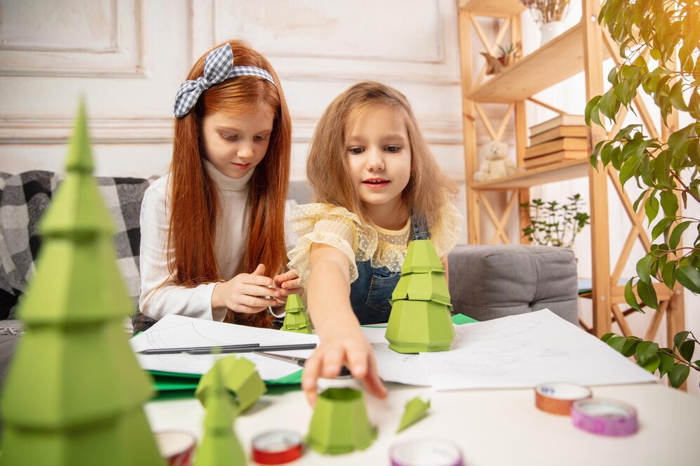 two-little-children-girls-together-creativity-house_155003-45137